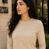 Close-up of QADIM washed beige long sleeve tee neckline and washed fabric