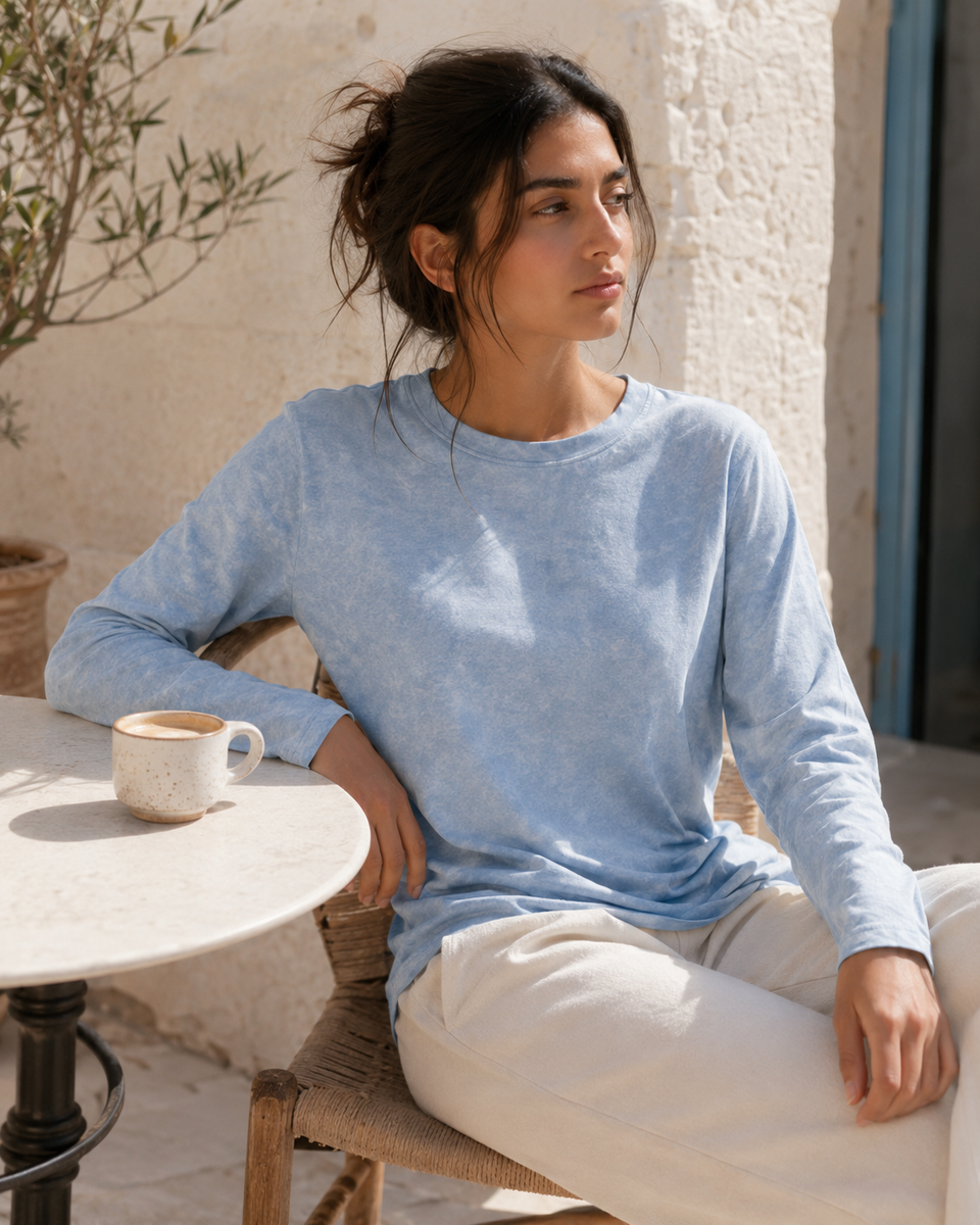 QADIM washed baby blue long sleeve tee, outdoor cafe editorial, full look