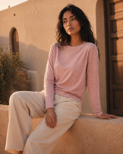QADIM washed pink long sleeve tee, golden-hour editorial, relaxed modest fit