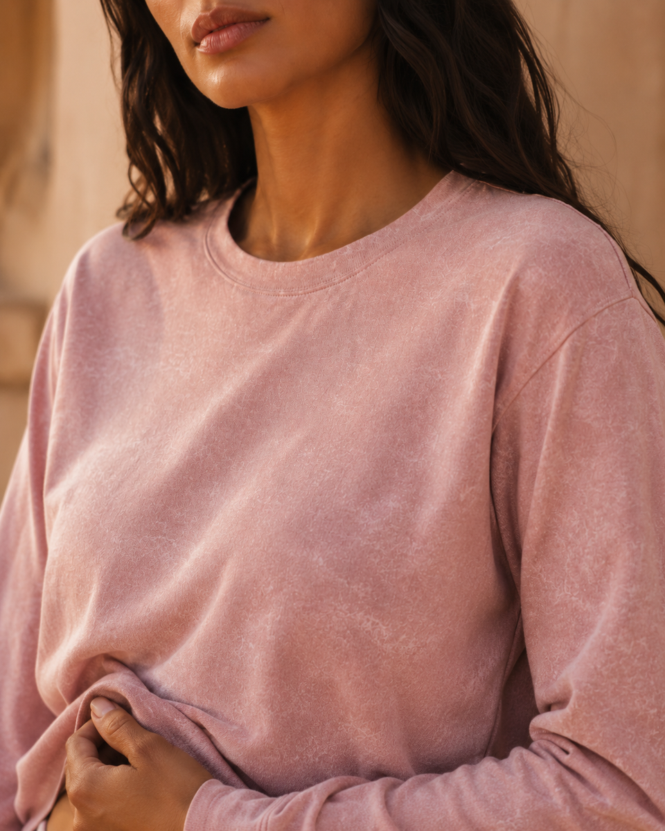 Close-up of QADIM washed pink long sleeve tee washed fabric texture