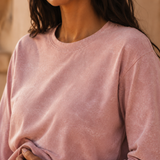 Close-up of QADIM washed pink long sleeve tee washed fabric texture