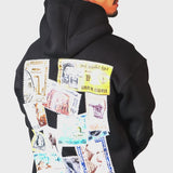 QADIM Tawabie relaxed hoodie in black, vintage stamps back print, in motion | هودي طوابع ريلاكس أسود في فيديو