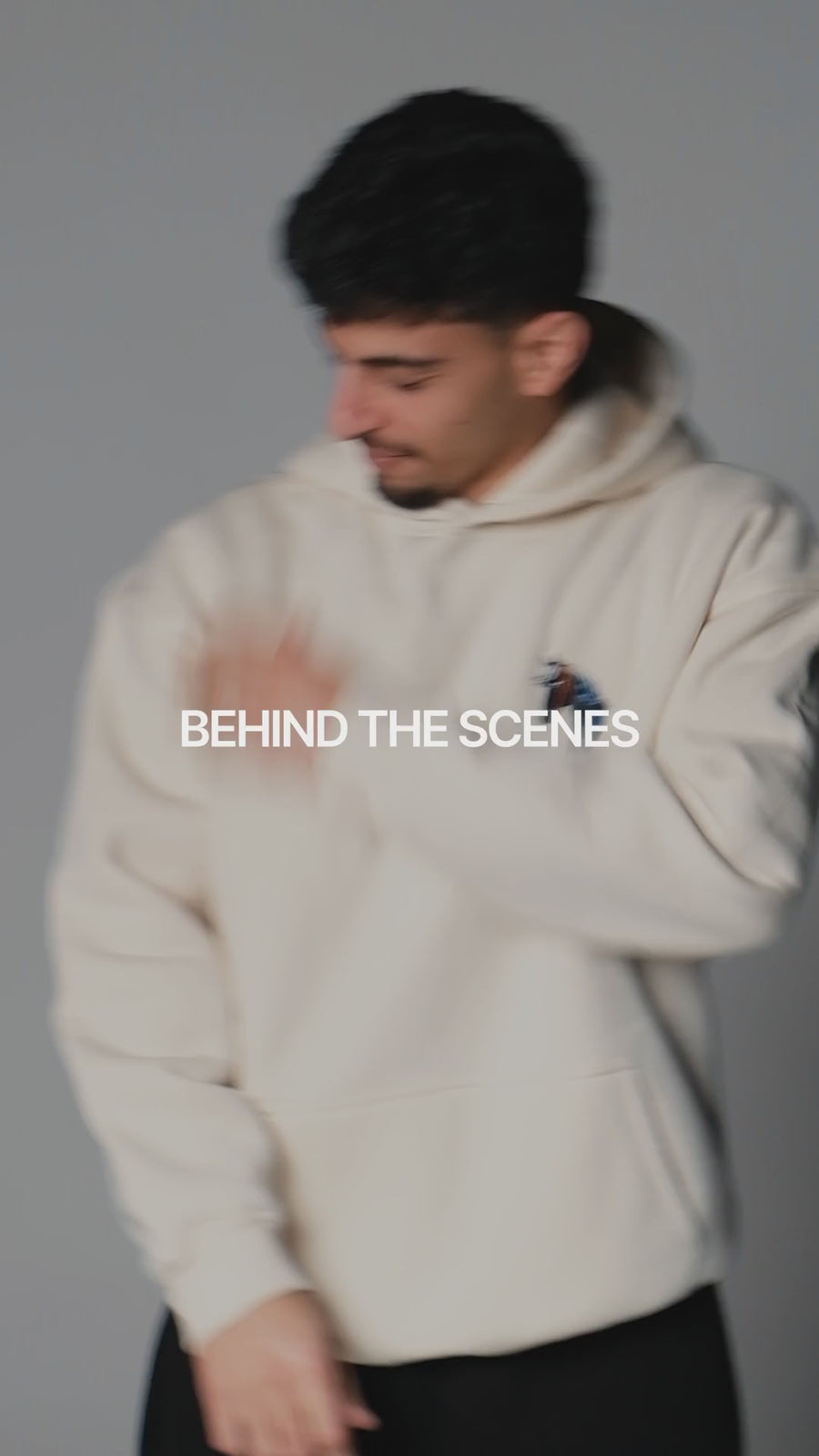 QADIM Safar relaxed hoodie in beige, horse back print and front, in motion | هودي سفر ريلاكس بيج في فيديو