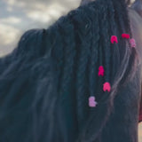 QADIM Asil washed hoodie in rose, calligraphy horse back print in motion