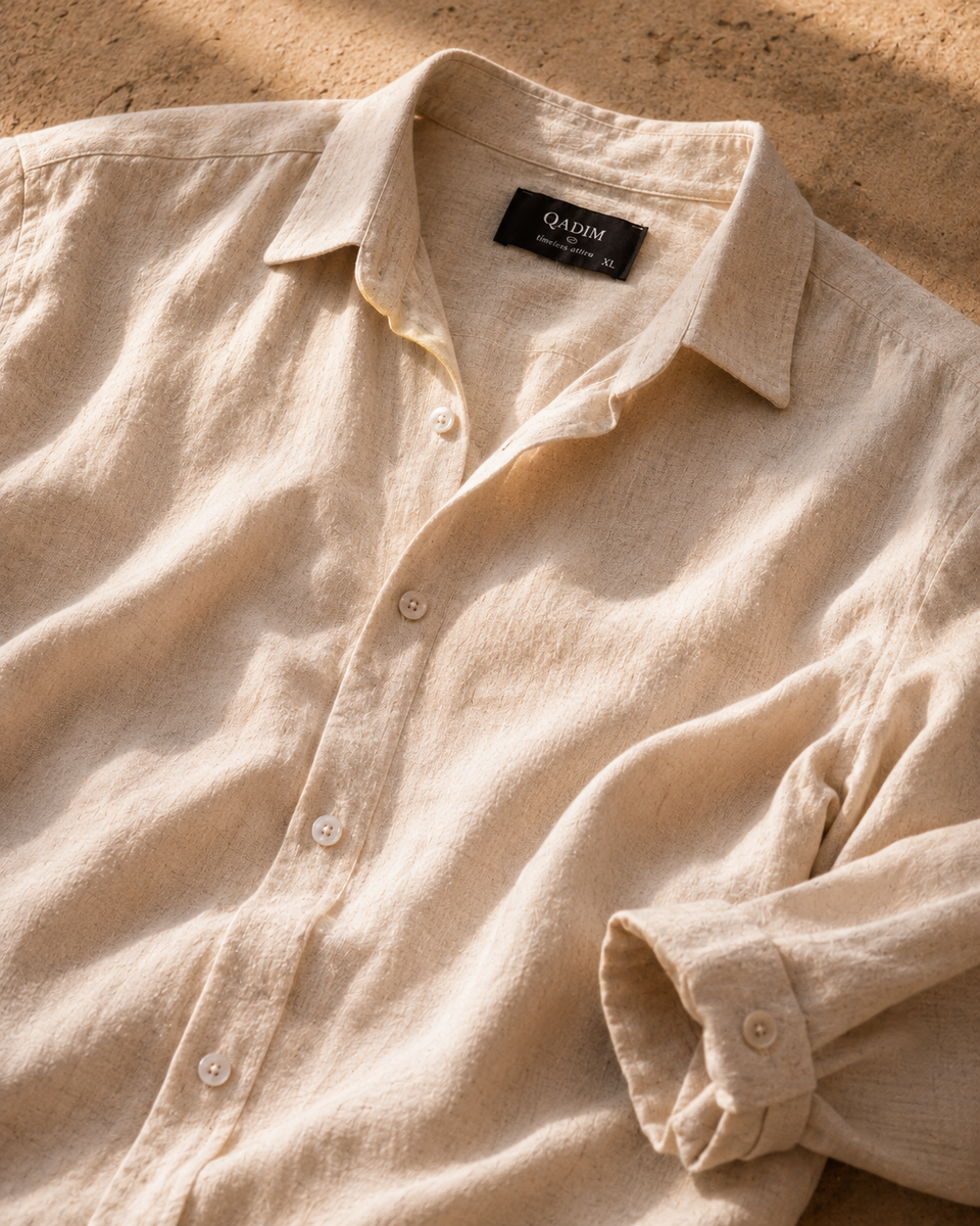 QADIM brand label on ATHAR Linen Relaxed Fit shirt fabric | تيكيت قديم على قماش قميص أثر الكتان الفضفاض