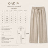 Linen drawstring pants with size chart and measurement guide on a light background