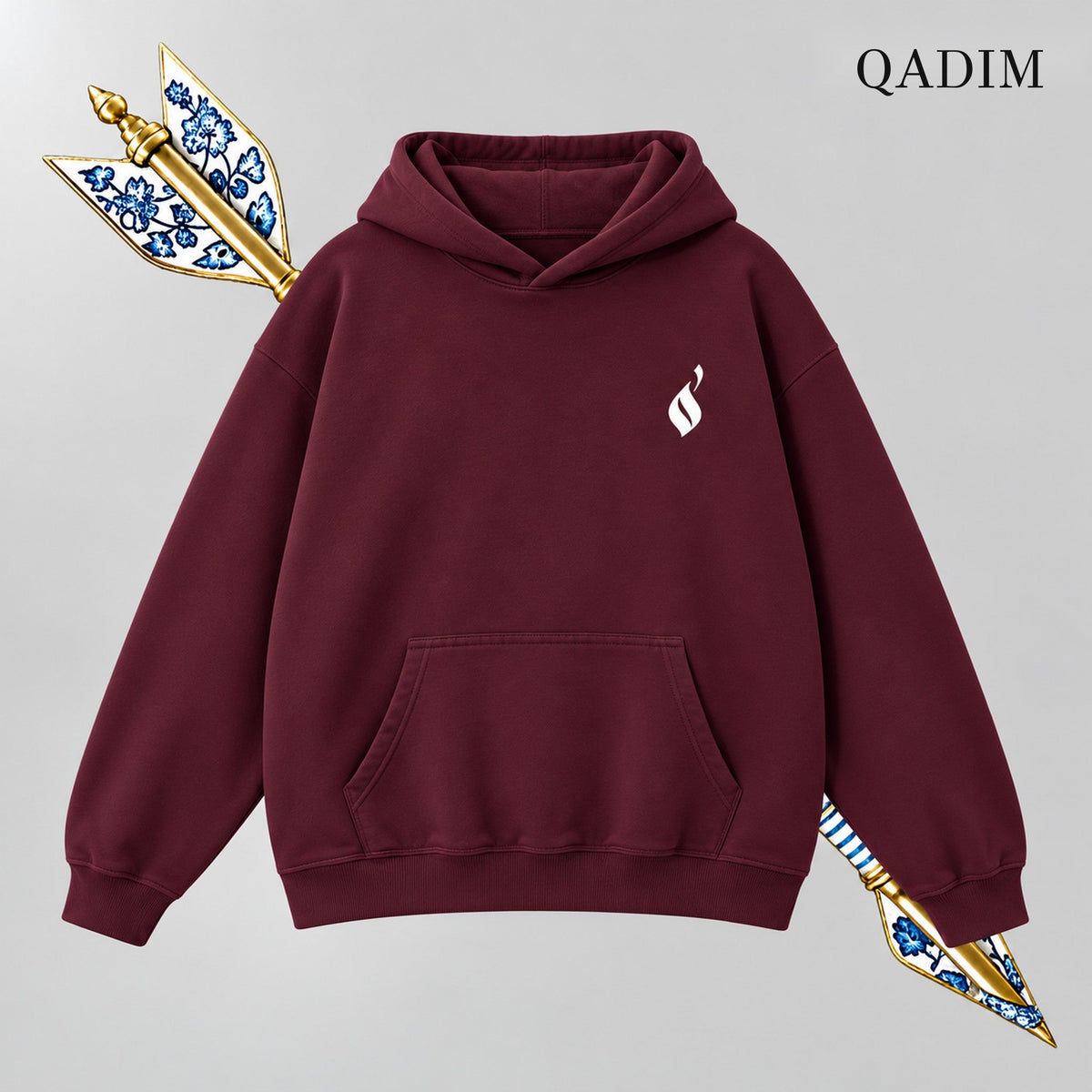 QADIM Sahm relaxed hoodie in burgundy, front emblem | هودي سهم ريلاكس نبيتي من قدّام