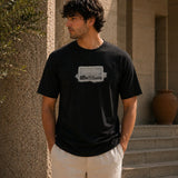 QADIM Naqsh black half sleeve tee front graphic worn by male model