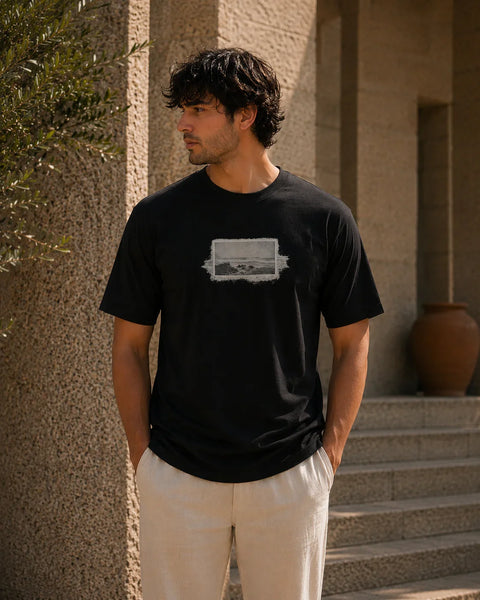 QADIM Naqsh black half sleeve tee front graphic worn by male model