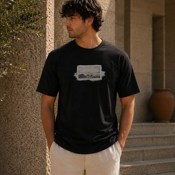 QADIM Naqsh black half sleeve tee front graphic worn by male model