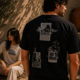 QADIM Naqsh half sleeve tee in black and beige worn by male and female models in a sunlit Mediterranean setting
