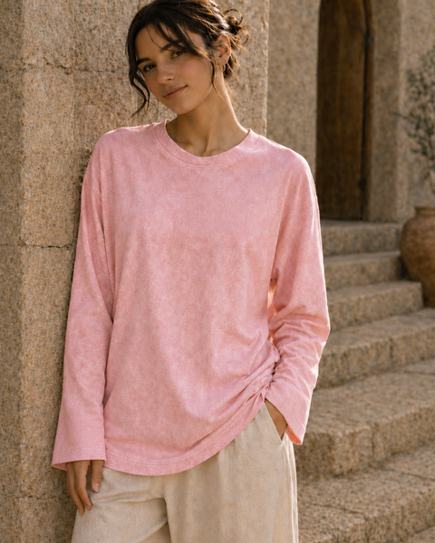 Washed pink long sleeve tee front view with relaxed fit and loose sleeves
