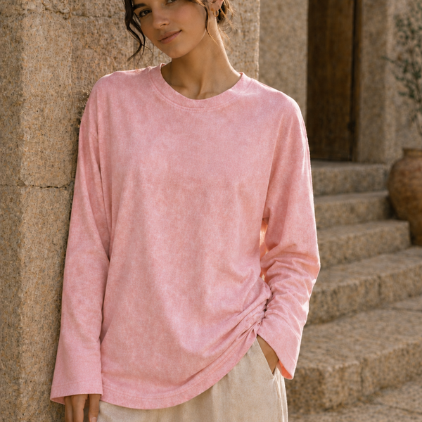 Washed pink long sleeve tee front view with relaxed fit and loose sleeves