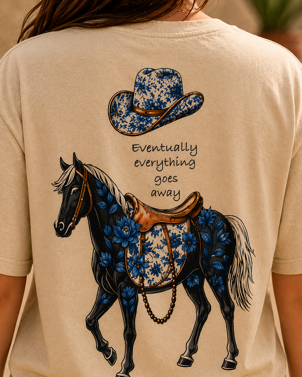 Beige t-shirt with a horse and floral cowboy hat design on the back