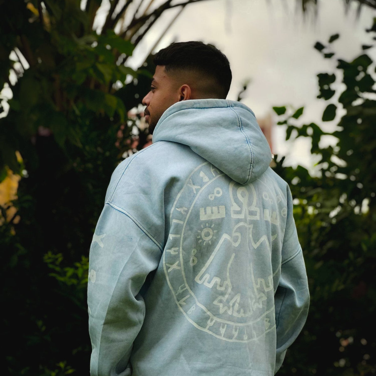 QADIM 7 Eagles washed hoodie in baby blue, side view | هودي ٧ نسور مغسول بيبي بلو