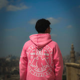 QADIM 7 Eagles washed hoodie in rose, seal back print, Cairo skyline | هودي ٧ نسور مغسول روز قدام القاهرة