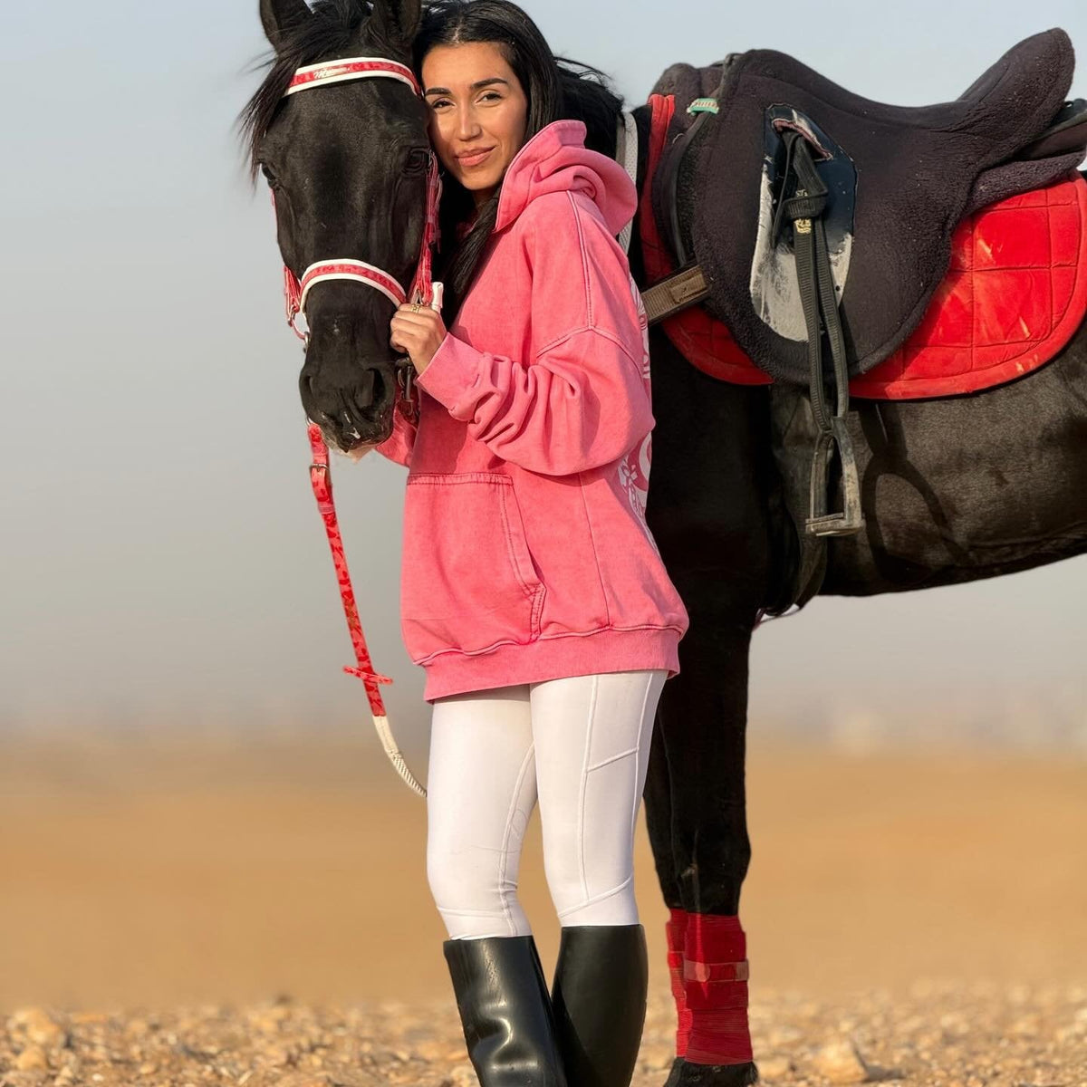 QADIM Asil washed hoodie in rose, calligraphy horse back print, with an Arabian horse — @nazly_hammadd | أصيل روز مع الحصان