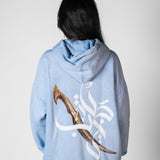 QADIM Jambiya washed hoodie in baby blue, dagger and calligraphy back print | ضهر هودي جنبية المغسول البيبي بلو