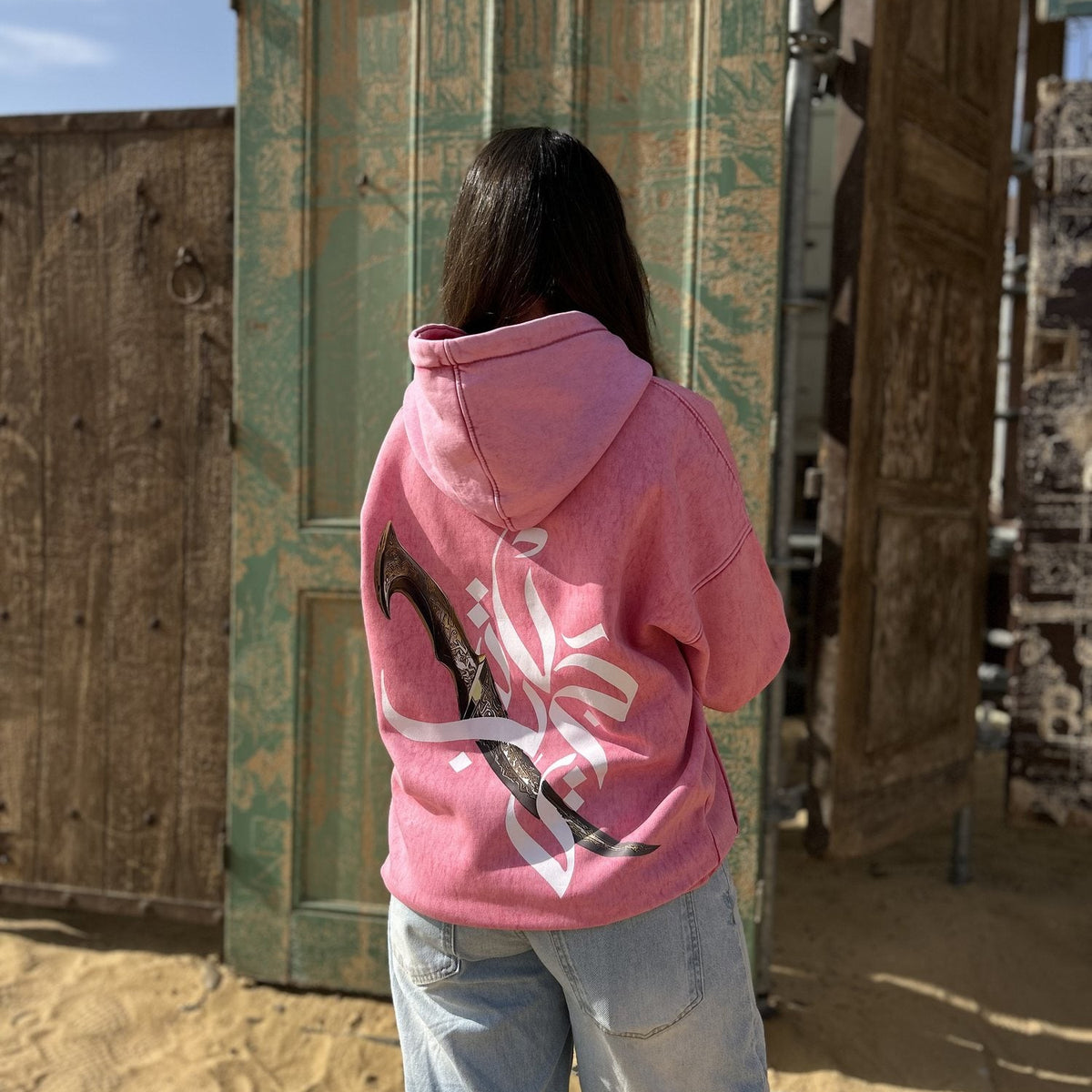 QADIM Jambiya washed hoodie in rose, dagger back print, desert | ضهر هودي جنبية المغسول الروز