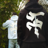 QADIM Sahm relaxed hoodie in black, back print, garden | هودي سهم ريلاكس أسود من ورا
