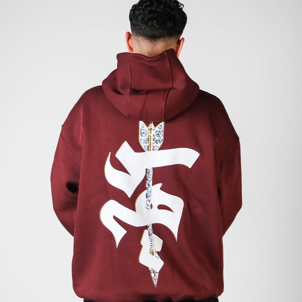 QADIM Sahm relaxed hoodie in burgundy, arrow and calligraphy back print | ضهر هودي سهم الريلاكس النبيتي