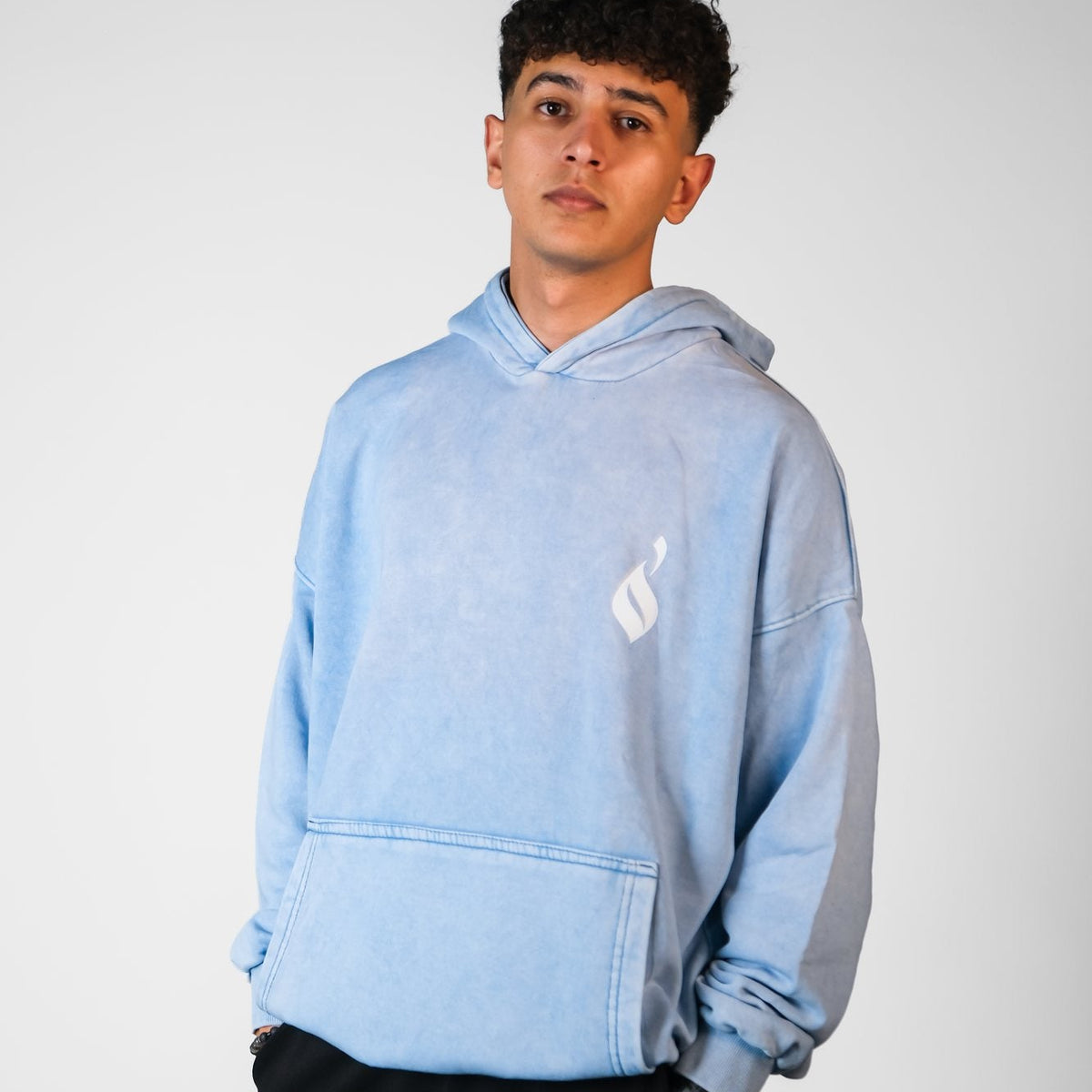QADIM Tawabie washed hoodie in baby blue, front, male model | هودي طوابع مغسول بيبي بلو من قدّام